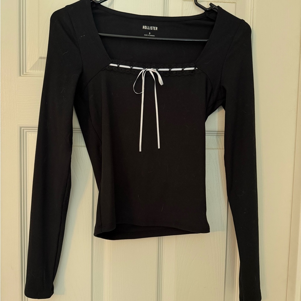 SOLD Hollister Women's Black Long Sleeve Tee with Bow